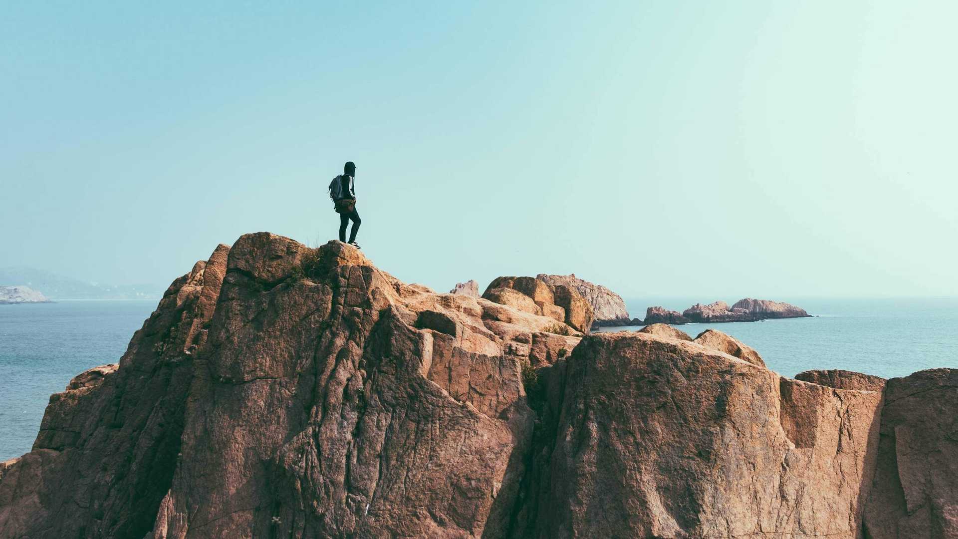 A Hiker looking over a mountain range